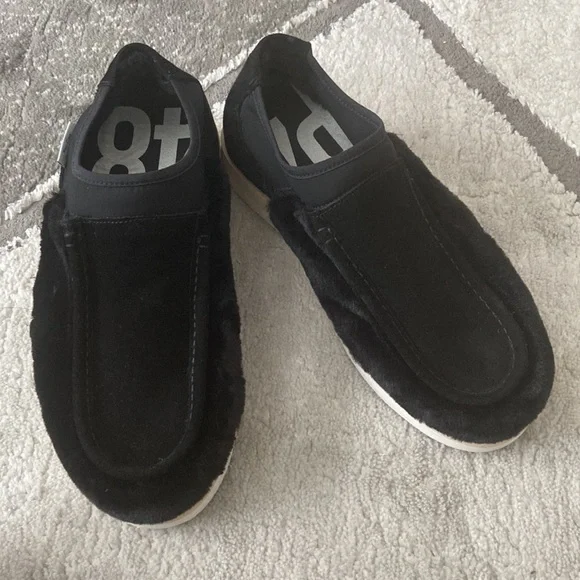 P448 bubble Genuine shearling slip on sneakerin black